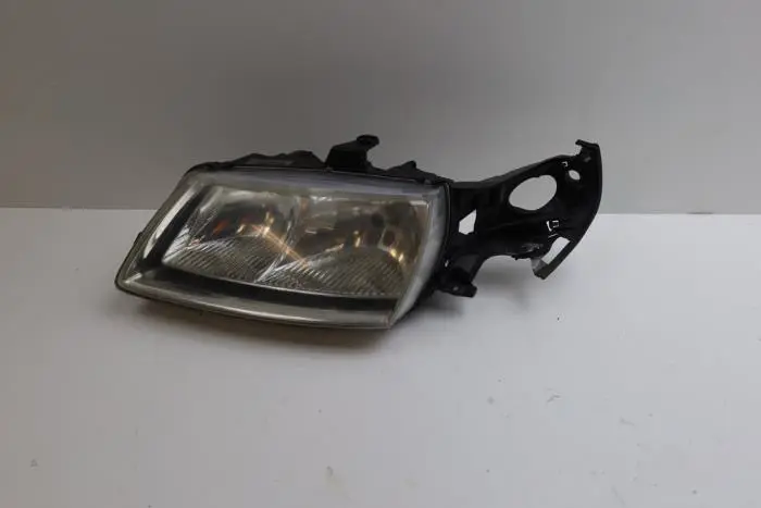 Headlight, left Saab 9-5